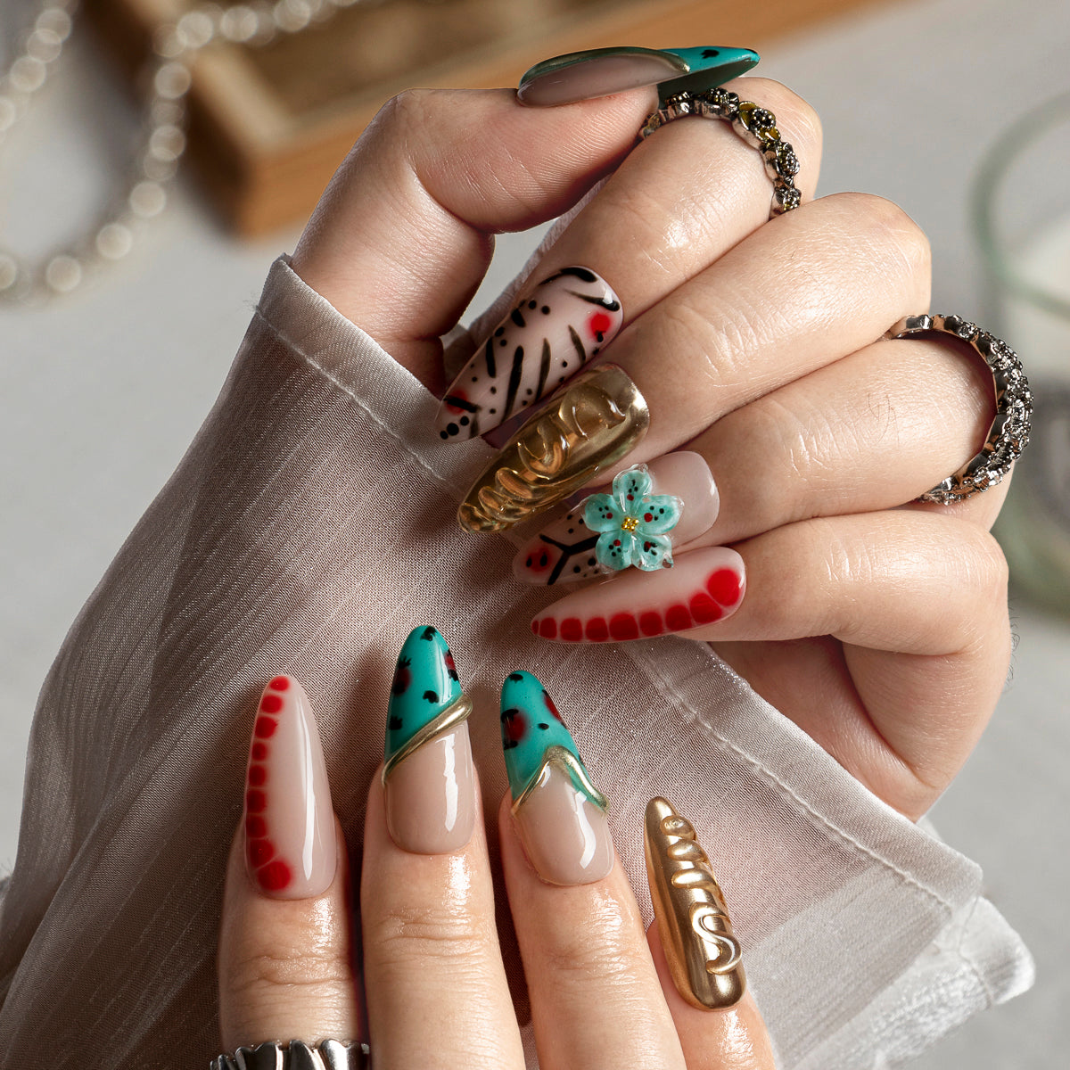 Turquoise Safari Chrome ALLO0012 press-on nails hand model scene view 1