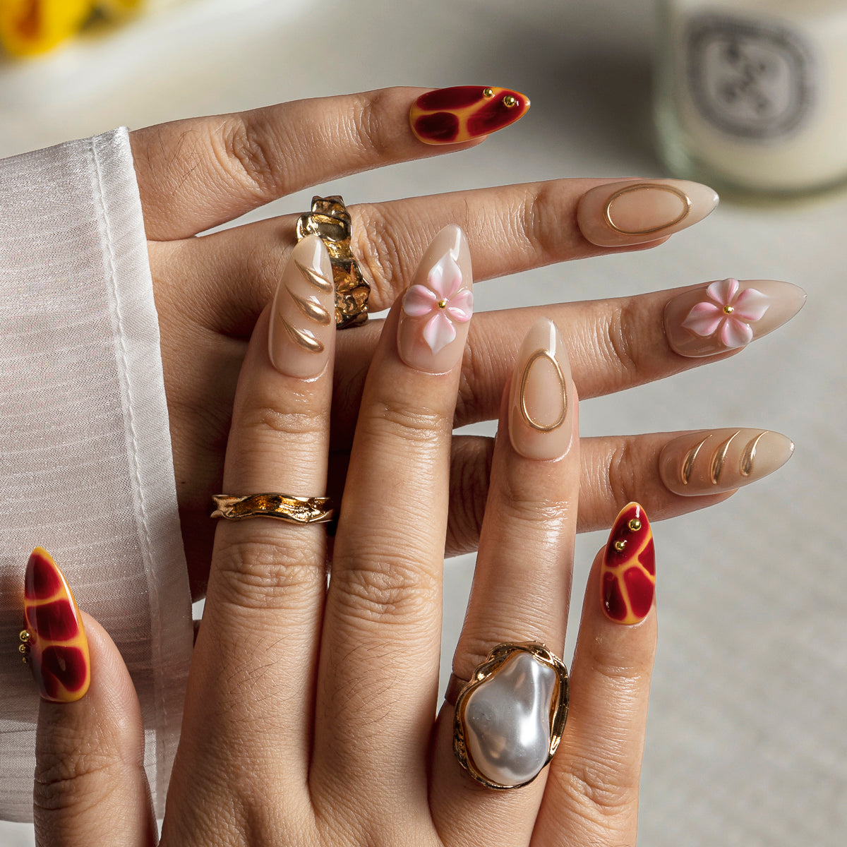 Burgundy Pearl Blossom ALME0014 press-on nails hand model scene view 1