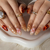 Burgundy Pearl Blossom ALME0014 press-on nails hand model scene view 2