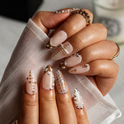 Ivory Cross Dot ALME0019 press-on nails hand model scene view 1