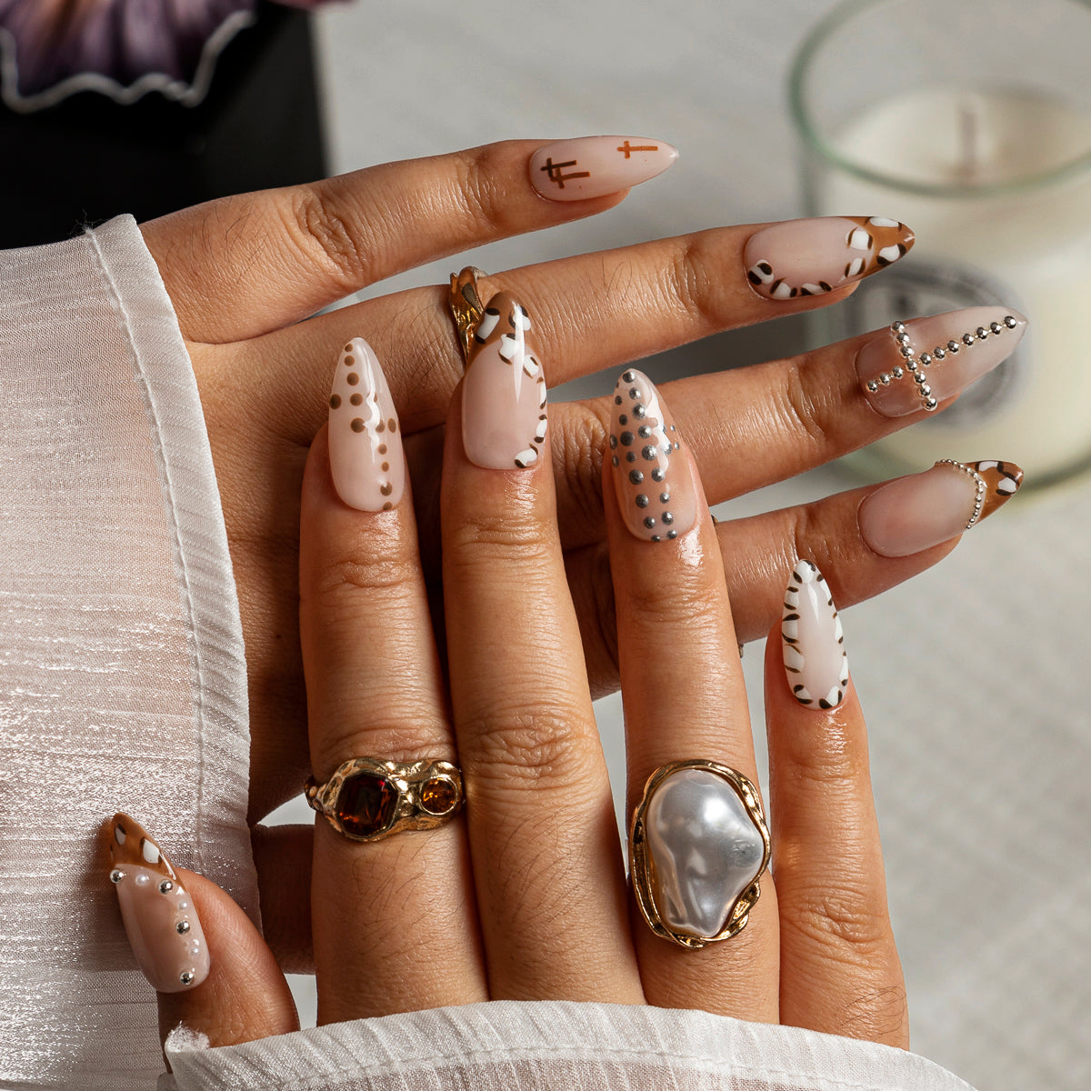 Ivory Cross Dot ALME0019 press-on nails hand model scene view 2