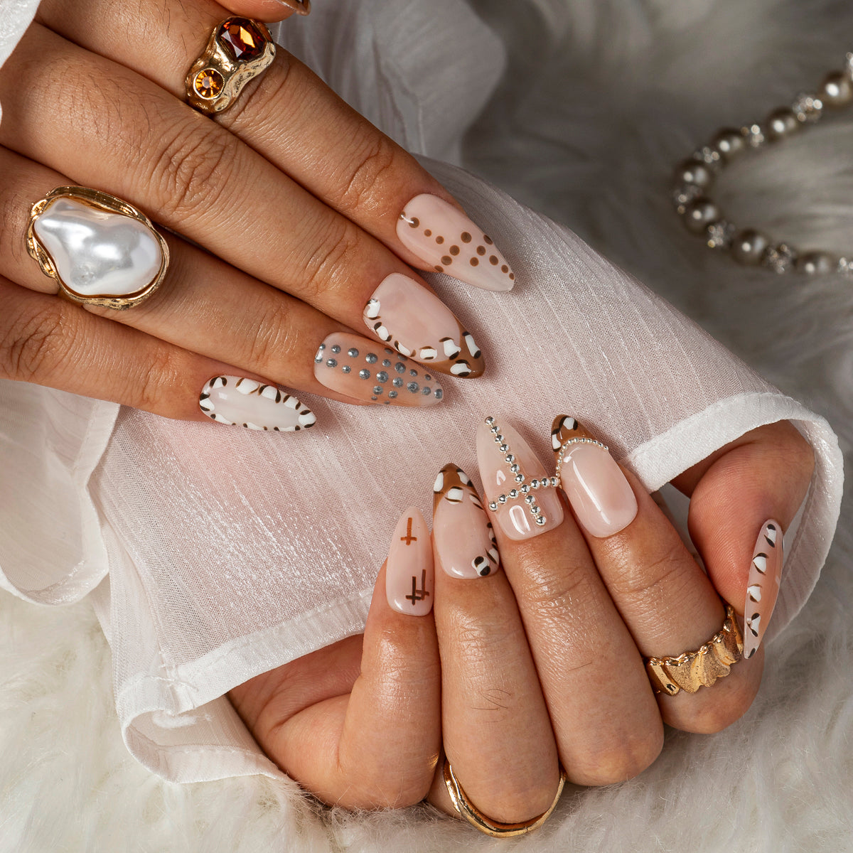 Ivory Cross Dot ALME0019 press-on nails hand model scene view 3