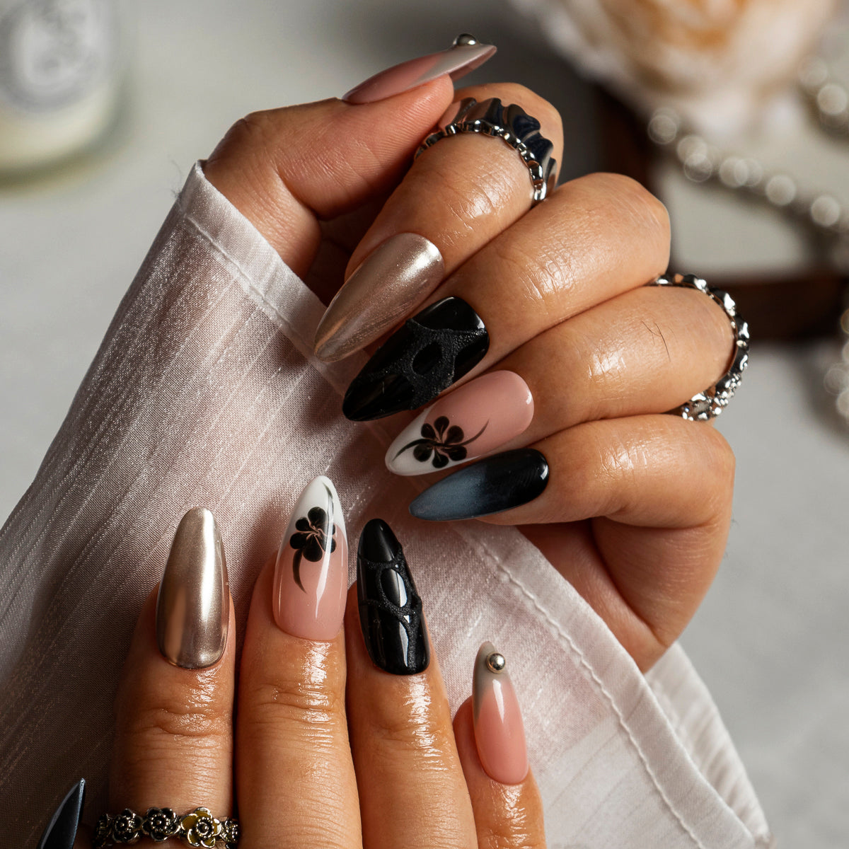 Champagne Noir Flower ALME0026 press-on nails hand model scene view 1