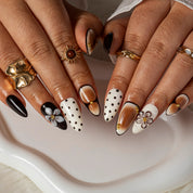 Noir Daisy Dot ALME0036 press-on nails hand model scene view 1
