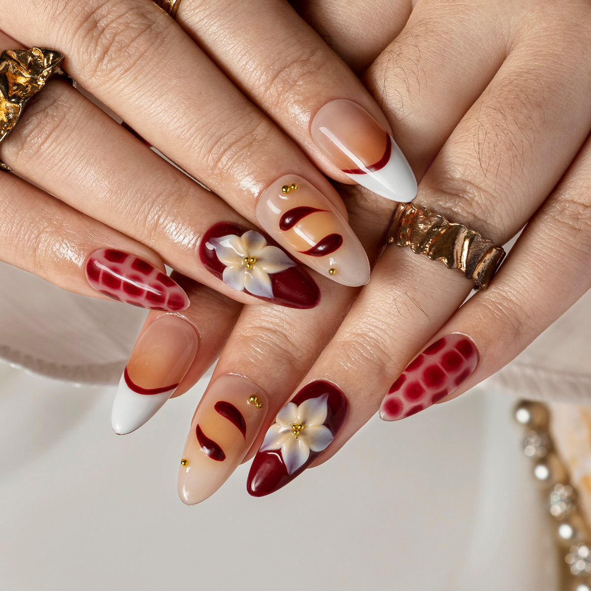 Merlot Daisy Plaid ALME0055 press-on nails hand model scene view 3