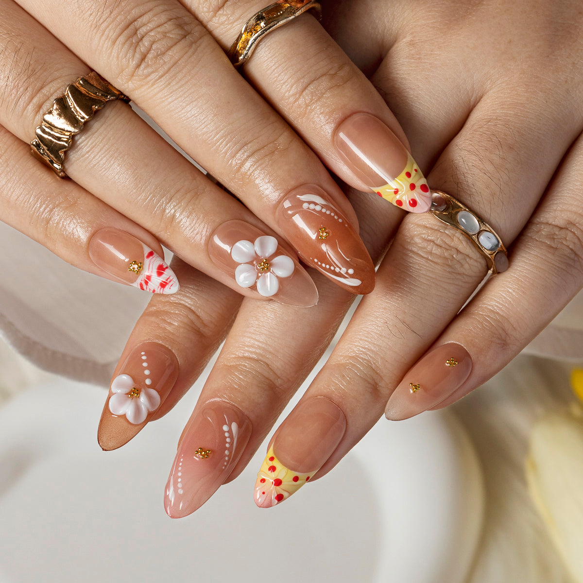 Peach Daisy Glow ALME0058 press-on nails hand model scene view 3