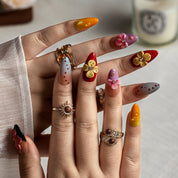 Mango Butterfly Pop ALME0059 press-on nails hand model scene view 1
