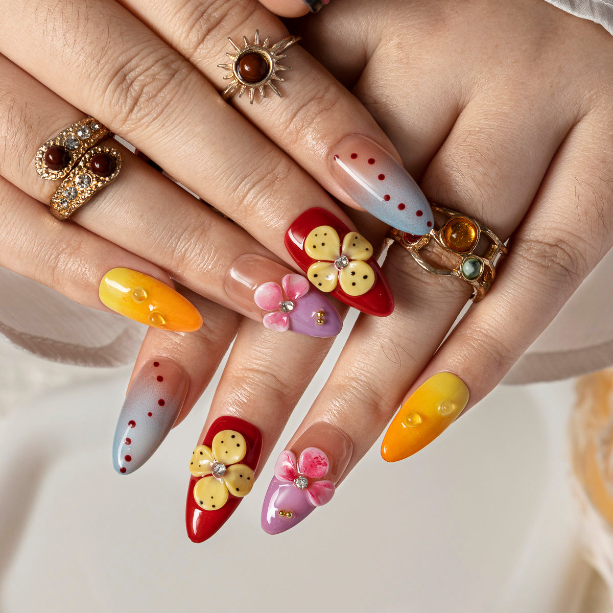 Mango Butterfly Pop ALME0059 press-on nails hand model scene view 3