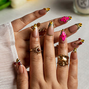 Fuchsia Sunburst Bloom ALME0065 press-on nails hand model scene view 1