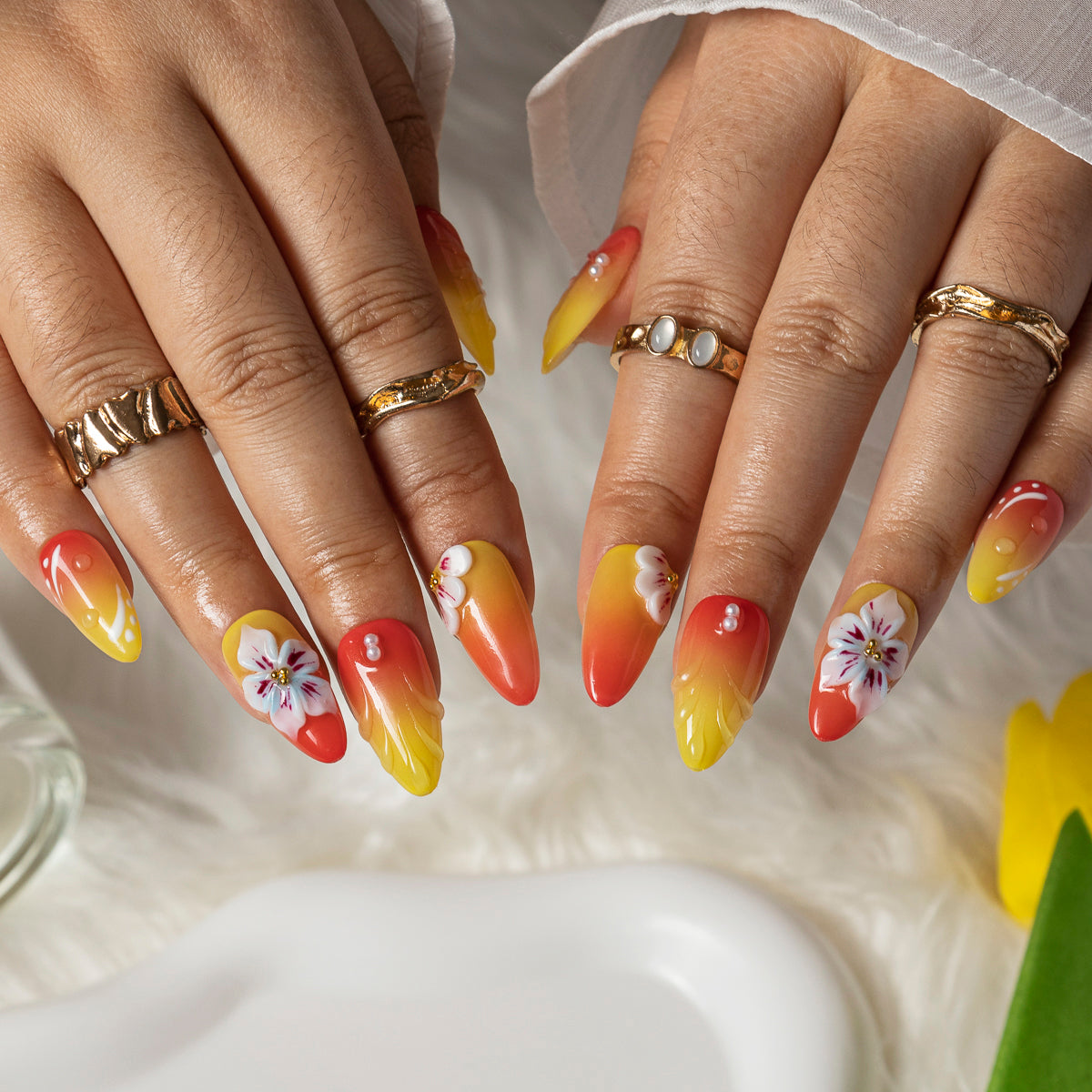Sunset Hibiscus Glow ALME0071 press-on nails hand model scene view 1