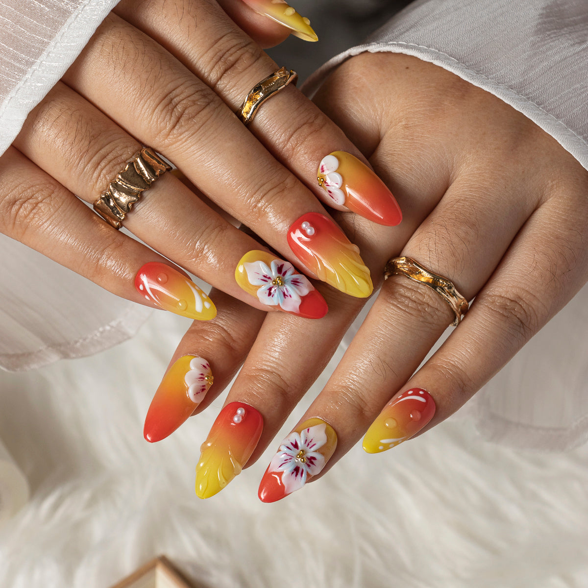 Sunset Hibiscus Glow ALME0071 press-on nails hand model scene view 2
