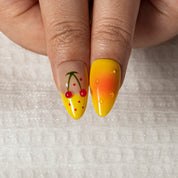 Citrus Picnic Garden ALME0074 press-on nails hand model scene view 3