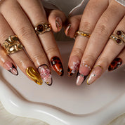 Amber Safari Charm ALME0079 press-on nails hand model scene view 2