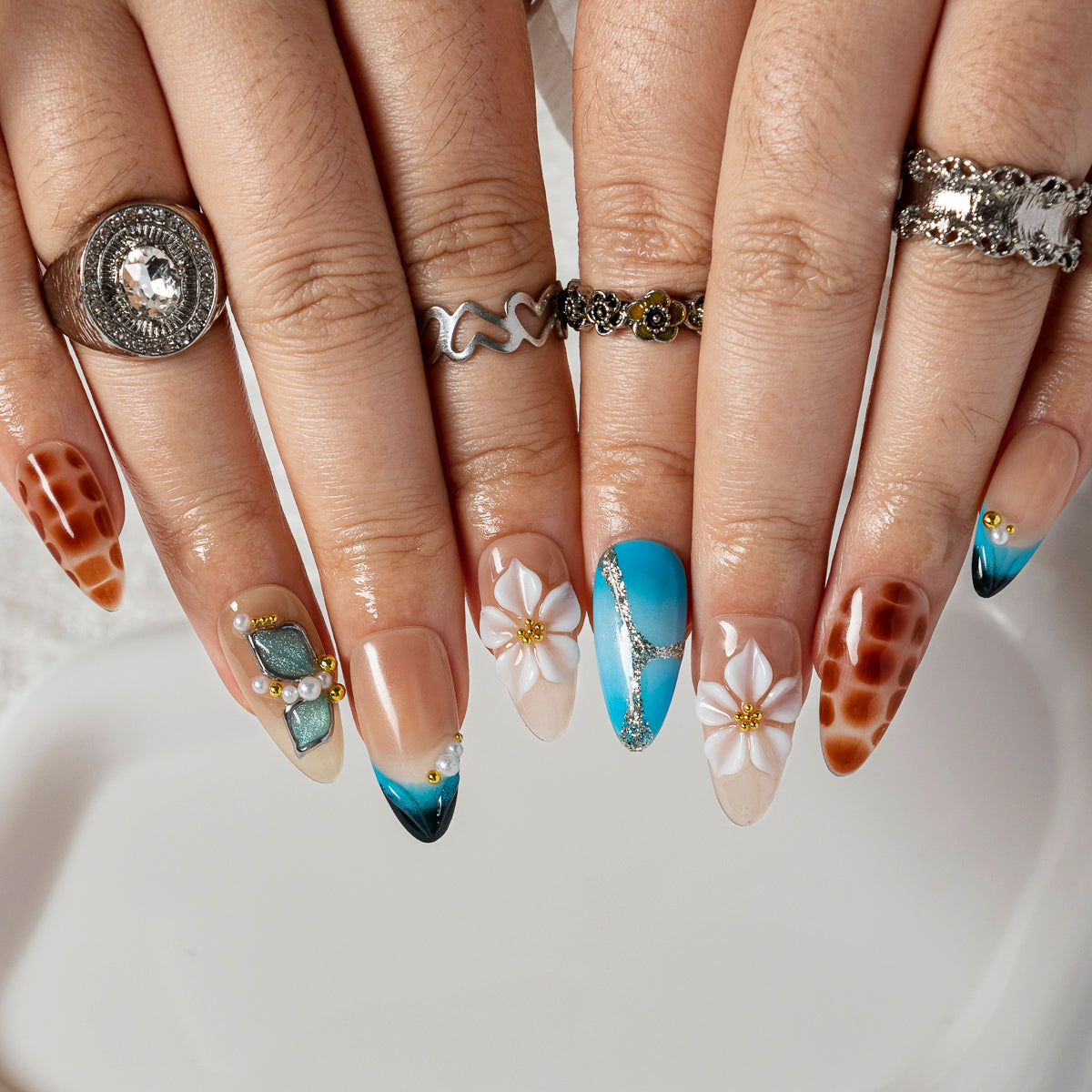 Turquoise Tortoise Bloom ALME0080 press-on nails hand model scene view 2