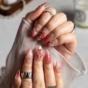 Coral Petal Glow ALME0101 press-on nails hand model scene view 1
