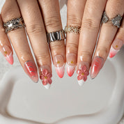 Coral Petal Glow ALME0101 press-on nails hand model scene view 2