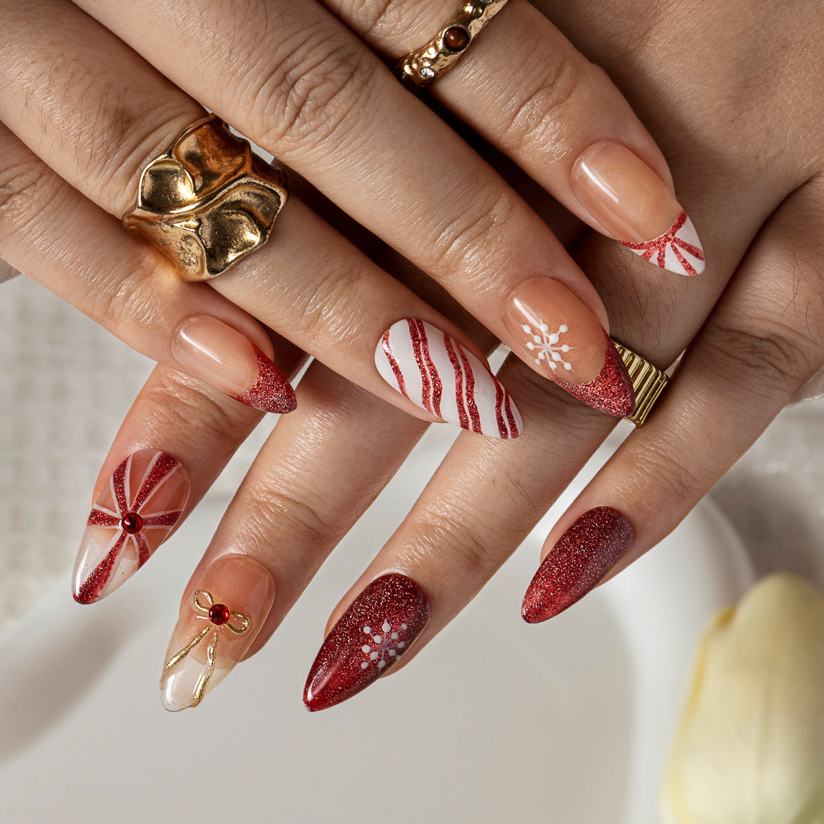 Burgundy Ribbon Snow ALME0108 press-on nails hand model scene view 3