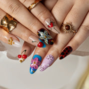 Cherry Patchwork Pop ALME0111 press-on nails hand model scene view 2