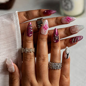 Magenta Bow Bloom ALME0123 press-on nails hand model scene view 1
