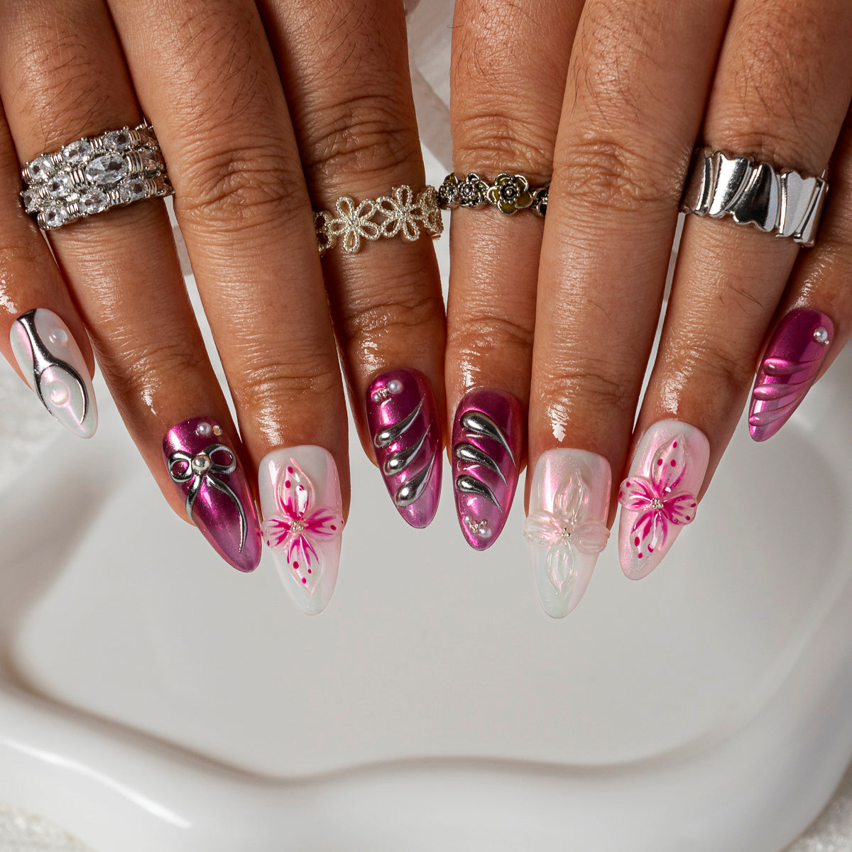 Magenta Bow Bloom ALME0123 press-on nails hand model scene view 2