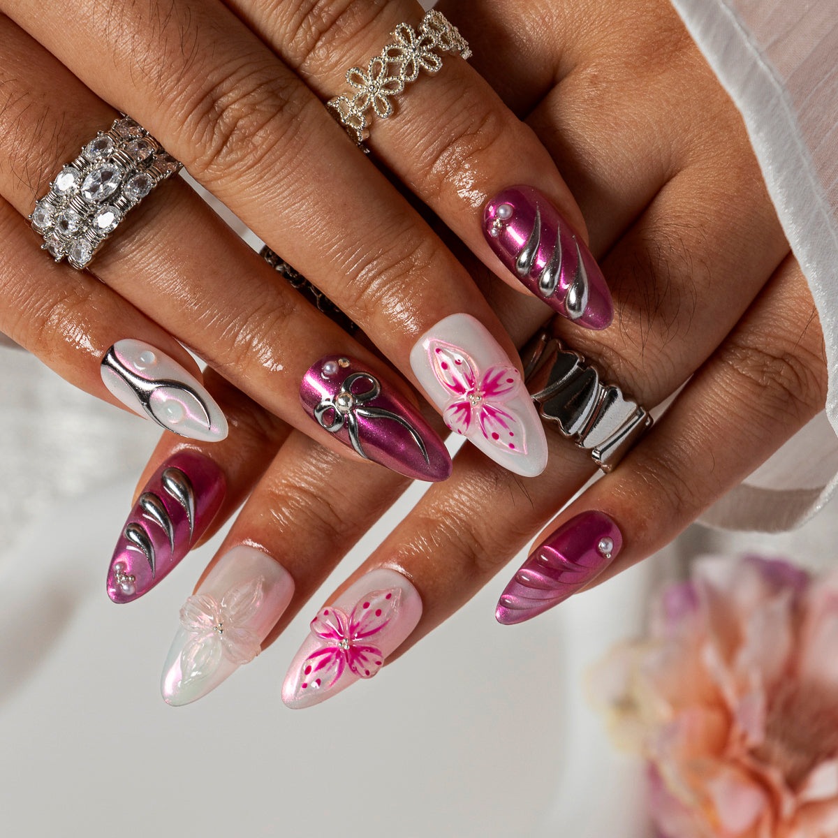Magenta Bow Bloom ALME0123 press-on nails hand model scene view 3