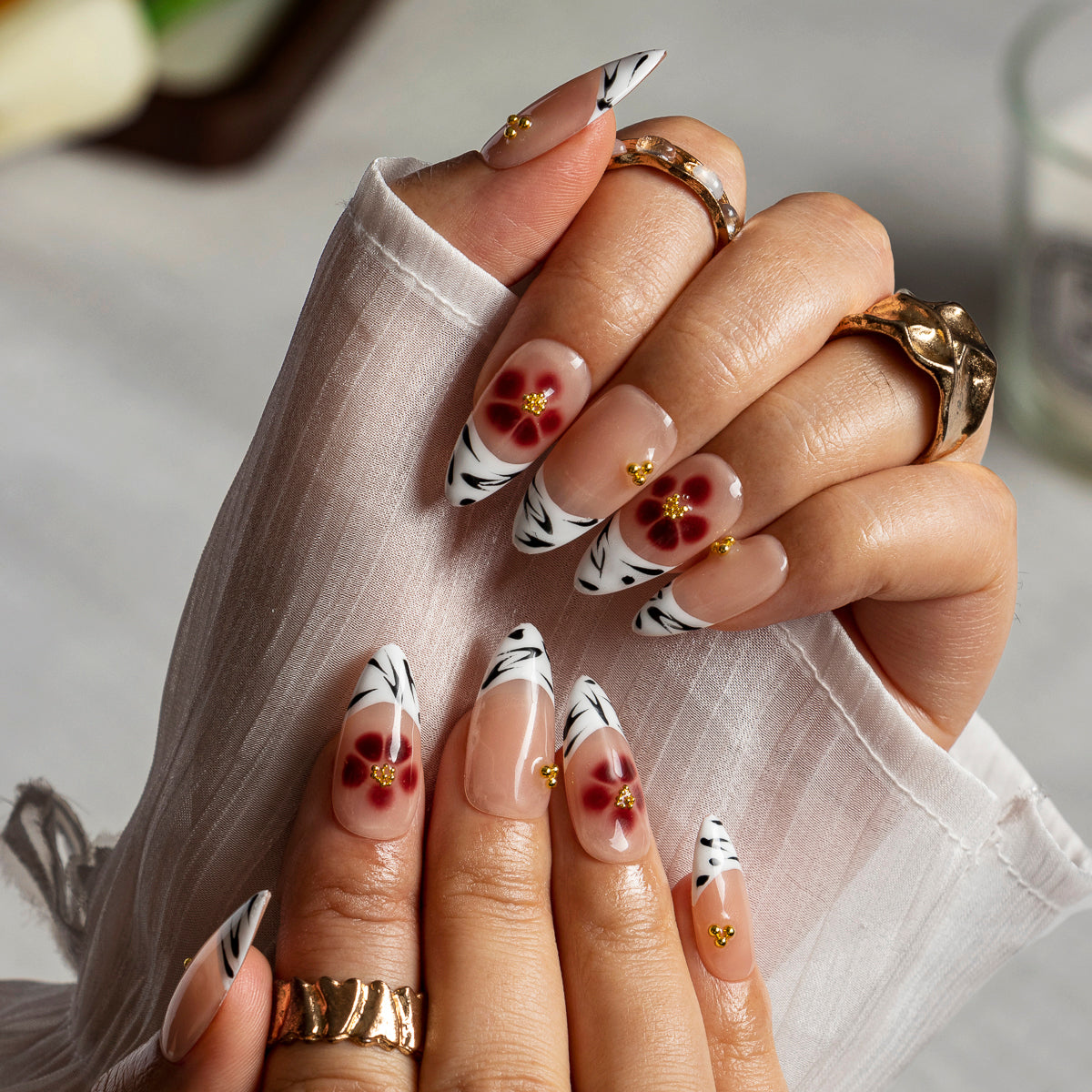 Peach Hibiscus Zebra ALME0125 press-on nails hand model scene view 1