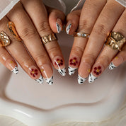 Peach Hibiscus Zebra ALME0125 press-on nails hand model scene view 2