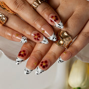 Peach Hibiscus Zebra ALME0125 press-on nails hand model scene view 3