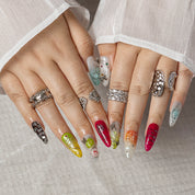 Aurora Chrome Bloom ALME0154 press-on nails hand model scene view 1