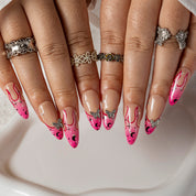 Pink Graffiti Vine ALME0159 press-on nails hand model scene view 1