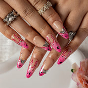 Pink Graffiti Vine ALME0159 press-on nails hand model scene view 2