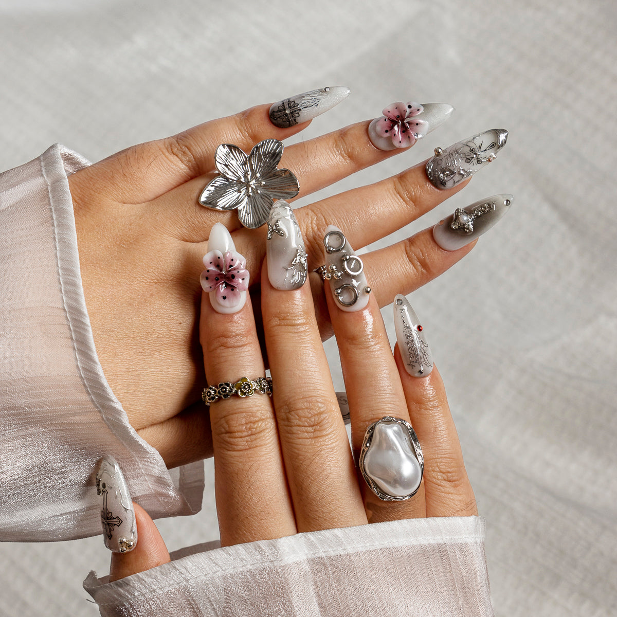 Rose Cross Relic ALME0161 press-on nails hand model scene view 1