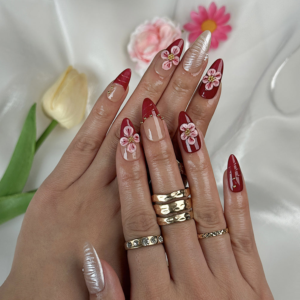 almond nails red medium almond press-on nails with hand-painted pink flowers and pearl accents for summer and beach parties