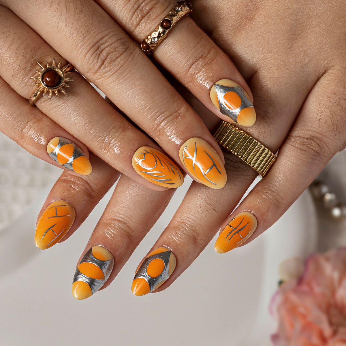 Tangerine Orbit Lines ALSH0016 press-on nails hand model scene view 2