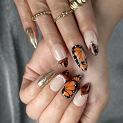 black and orange nails medium almond press-on nails with brown tones gold metallic luster and graphic accents for summer beach party prom winter style