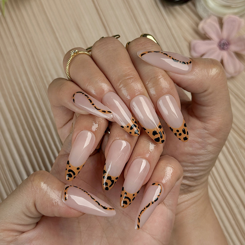 black and orange nails medium almond press-on nails with nude base leopard french tips simple nail art fall prom style
