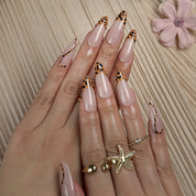 black and orange nails medium almond press-on nails with nude base leopard french tips simple nail art fall prom style