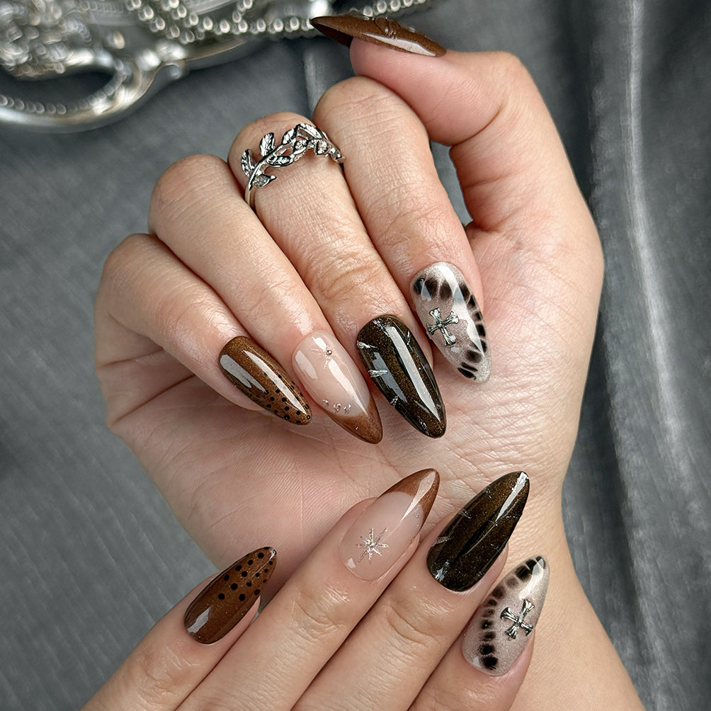 black nail art designs medium almond press-on nails in black and brown with smoky cool fall holiday style