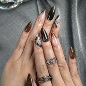 black nail art designs medium almond press-on nails in black and brown with smoky cool fall holiday style