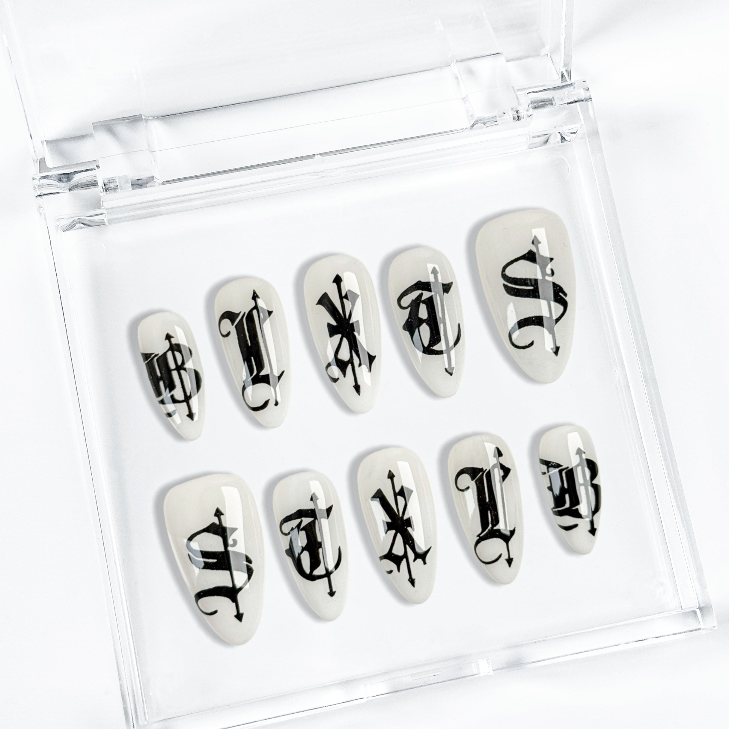 Black and white french nails, gothic blackletter dagger.