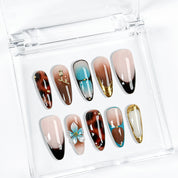 black with gold nails long almond press-on nails with blue brown flower and metallic gold details