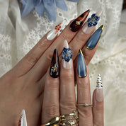 blue almond nails long stiletto press-on nails with blue gold and white accents flower detail winter holiday cool style