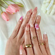 brown nude nails medium almond press-on nails with pink flower accents and soft orange detail