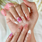 brown nude nails medium almond press-on nails with pink flower accents and soft orange detail