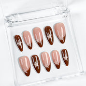 burgundy nail paint medium almond press-on nails with nude base French tip design and simple star nail art for fall prom