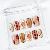 classy simple flower nail art short square brown red luxury press-on nails with floral and glossy gold details