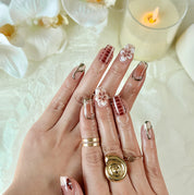 classy simple flower nail art short square brown red luxury press-on nails with floral and glossy gold details