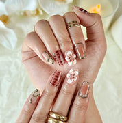 classy simple flower nail art short square brown red luxury press-on nails with floral and glossy gold details
