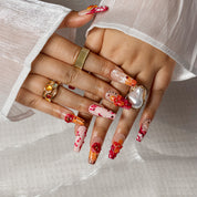 Tangerine Bloom Pop COME0008 press-on nails hand model scene view 2
