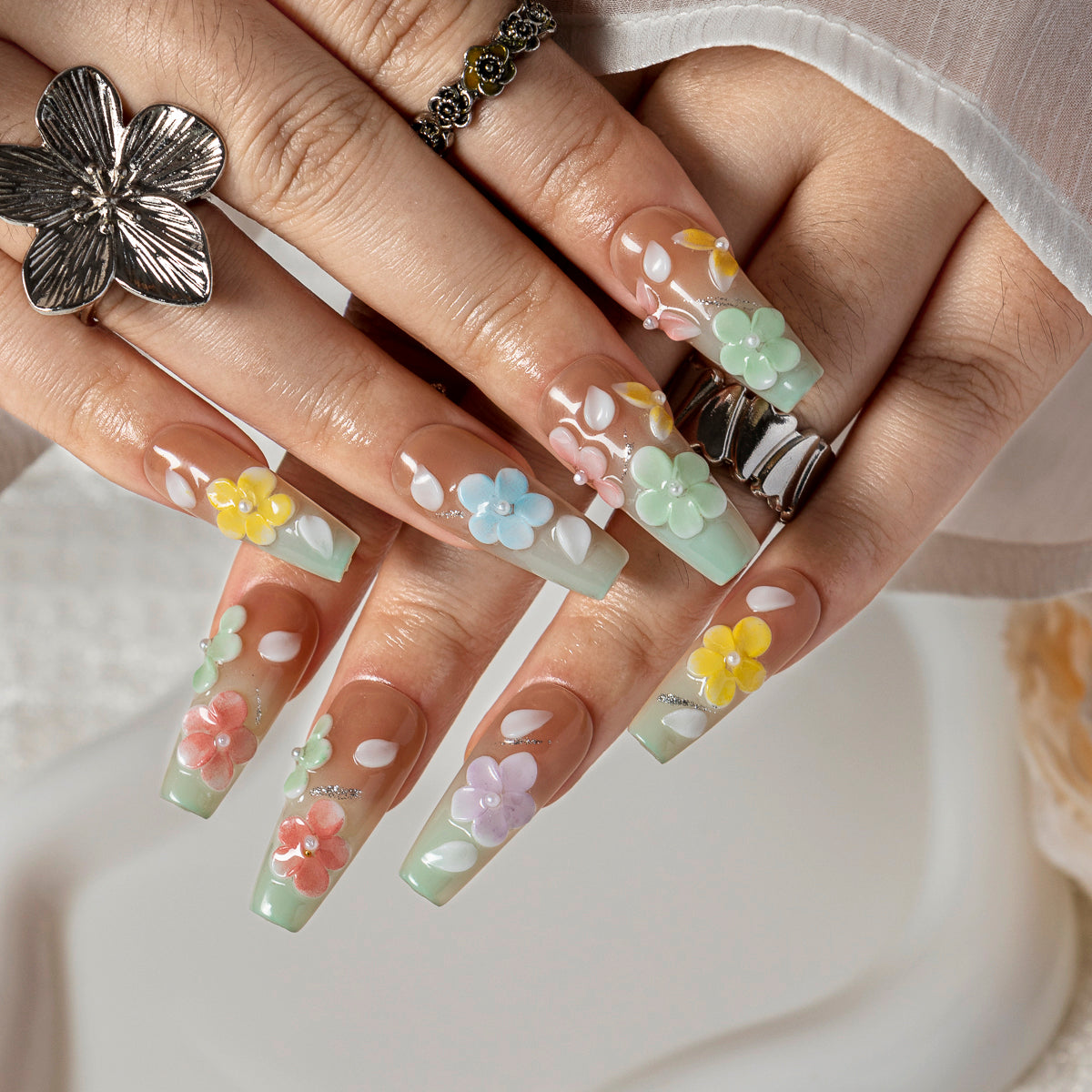 Mint Meadow Bloom COME0017 press-on nails hand model scene view 1